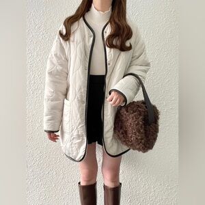 White Quilted Jacket with Black Trim